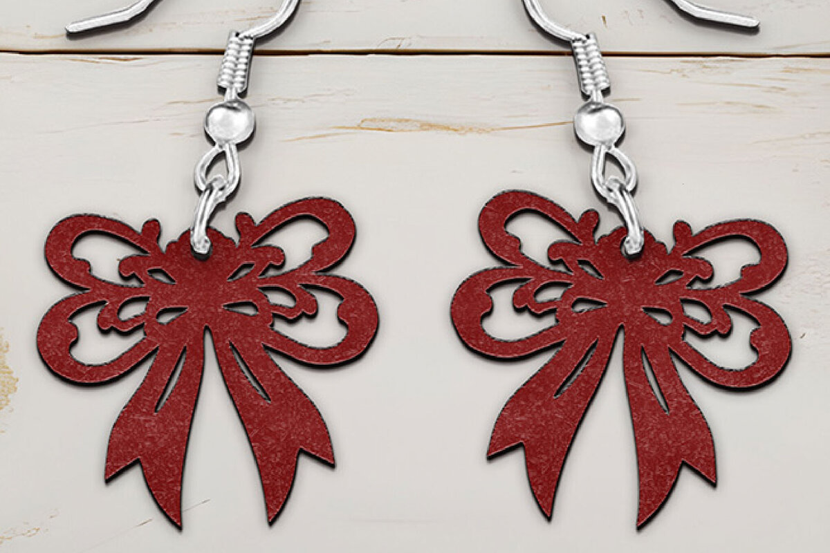 Σετ των 3 Intra απο ξύλο plywood 3mm-4mm πάχος Χριστουγεννιάτικα σκουλαρίκια με λέιζερ με φιόγκο. Δίασταση 4x4 cm INTRAFABR-107624120