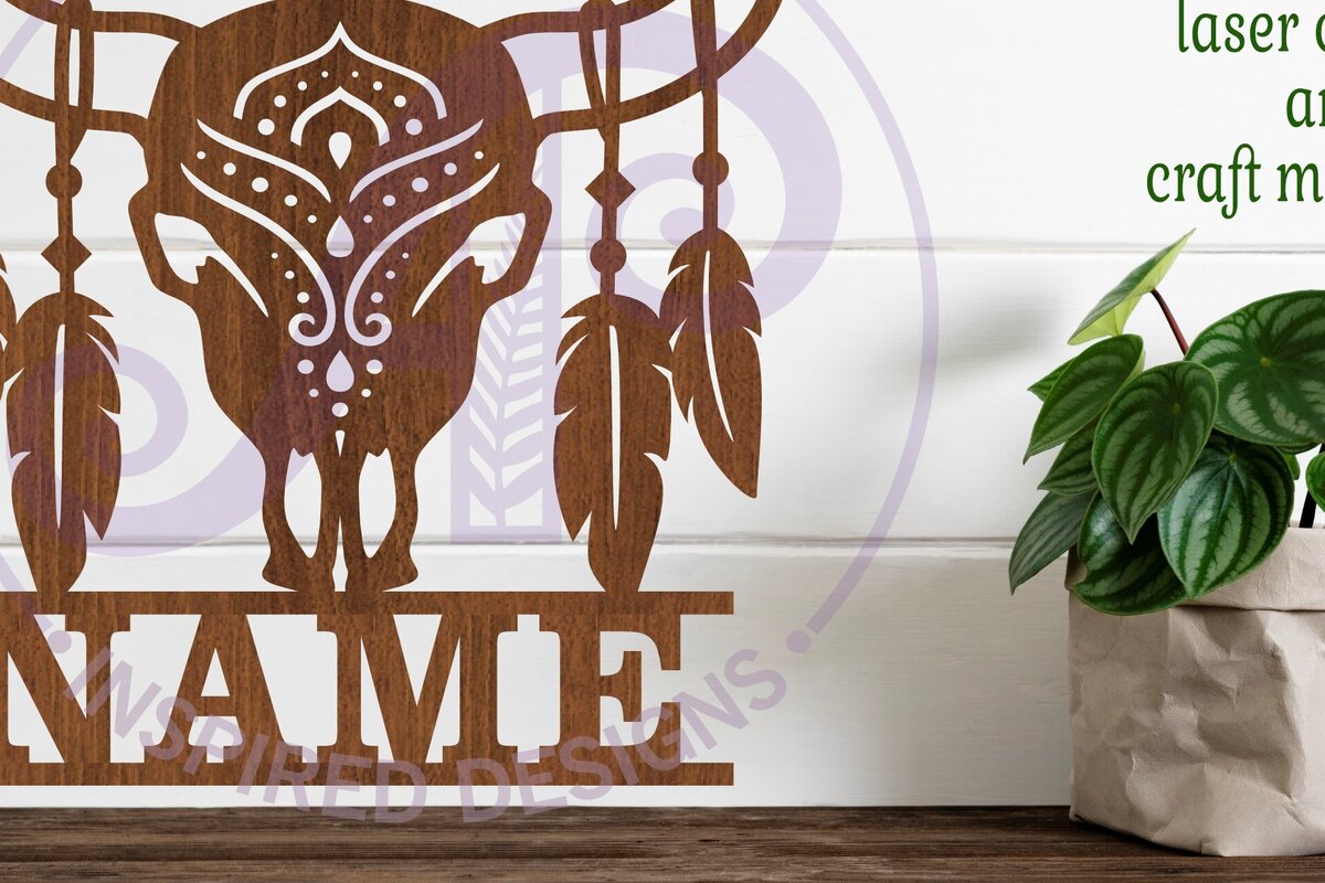 Intra απο ξύλο plywood  Χρώμα wenge 3mm-4mm πάχος - Σχέδιο με το όνομα του κρανίου και των φτερών αγελάδας Δίασταση 30x20 cm INTRAFABR-79859413