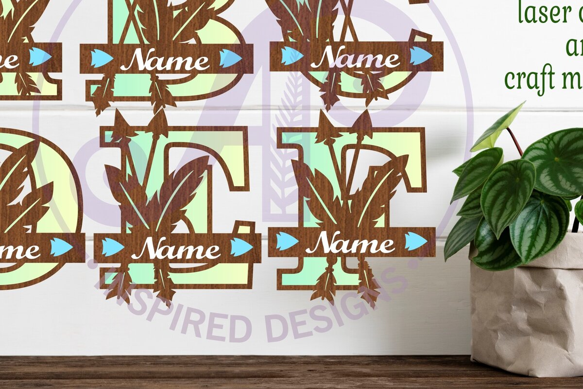 Intra απο ξύλο plywood  Χρώμα wenge 3mm-4mm πάχος - Πακέτο γραμμάτων μονόγραμμα με φτερά και βέλη Δίασταση 30x20 cm INTRAFABR-25097460