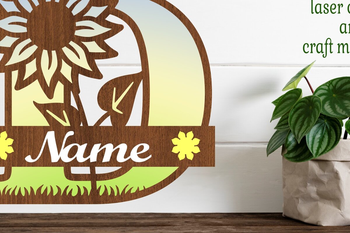 Σετ των 2 Intra απο ξύλο plywood 3mm-4mm πάχος – Μονόγραμμα ηλίανθου κεφαλαίο Γράμμα D Δίασταση  20x20 cm INTRAFABR-75965055