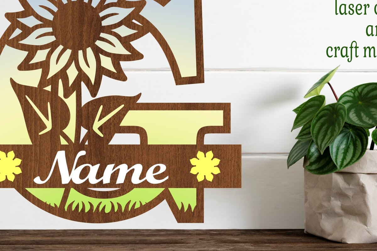 Σετ των 2 Intra απο ξύλο plywood 3mm-4mm πάχος – Μονόγραμμα ηλίανθου κεφαλαίο Γράμμα G Δίασταση  20x20 cm INTRAFABR-75965136