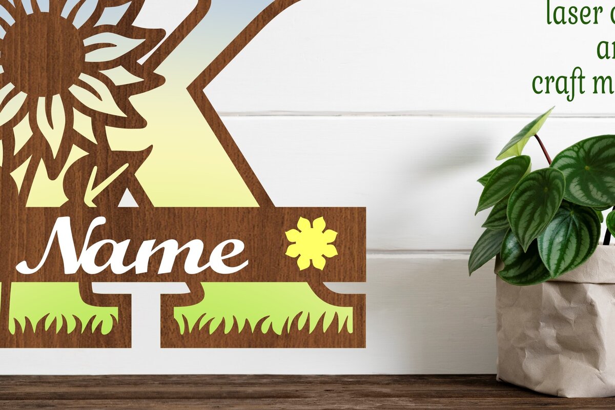 Σετ των 2 Intra απο ξύλο plywood 3mm-4mm πάχος – Μονόγραμμα ηλίανθου κεφαλαίο γράμμα K Δίασταση  20x20 cm INTRAFABR-75965251