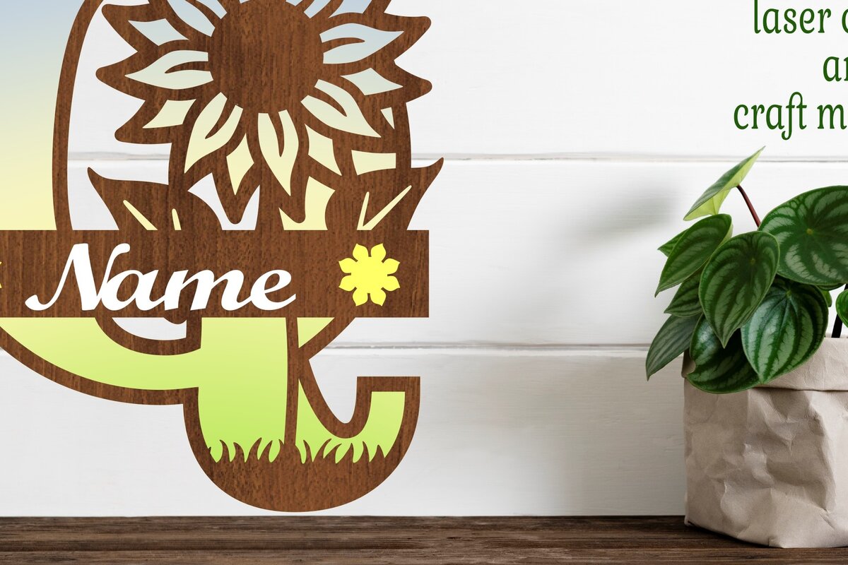 Σετ των 2 Intra απο ξύλο plywood 3mm-4mm πάχος – Μονόγραμμα ηλίανθου κεφαλαίο Γράμμα Q Δίασταση  20x20 cm INTRAFABR-75965432