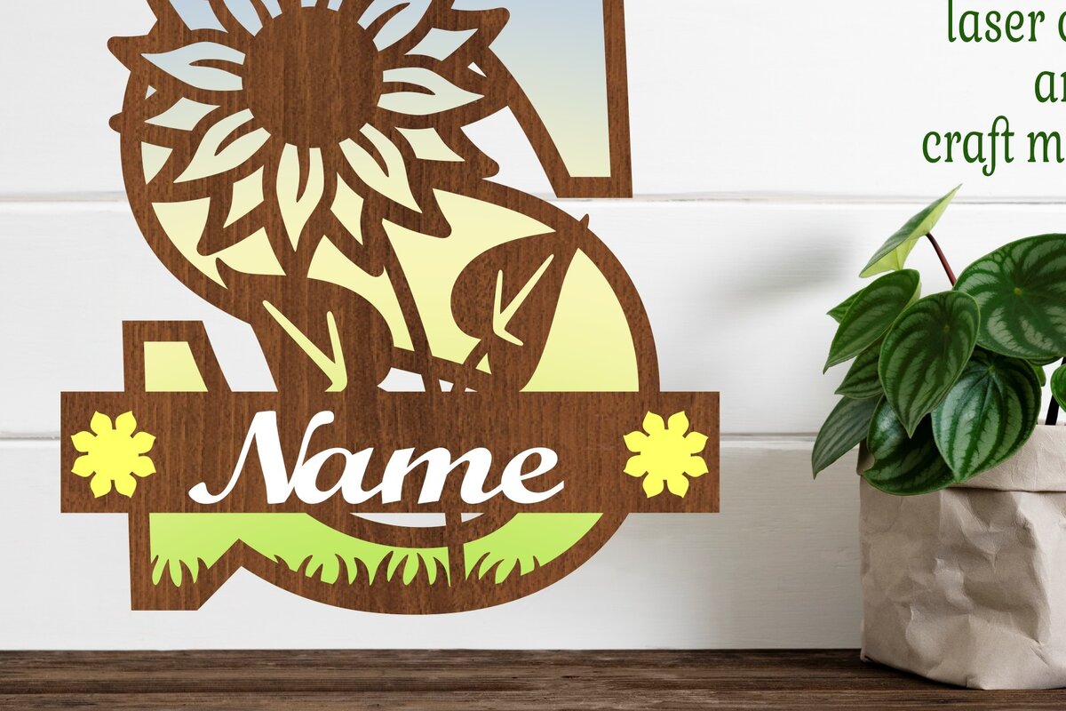 Σετ των 2 Intra απο ξύλο plywood 3mm-4mm πάχος – Ηλίανθος κεφαλαίο μονόγραμμα Γράμμα S Δίασταση  20x20 cm INTRAFABR-75965489