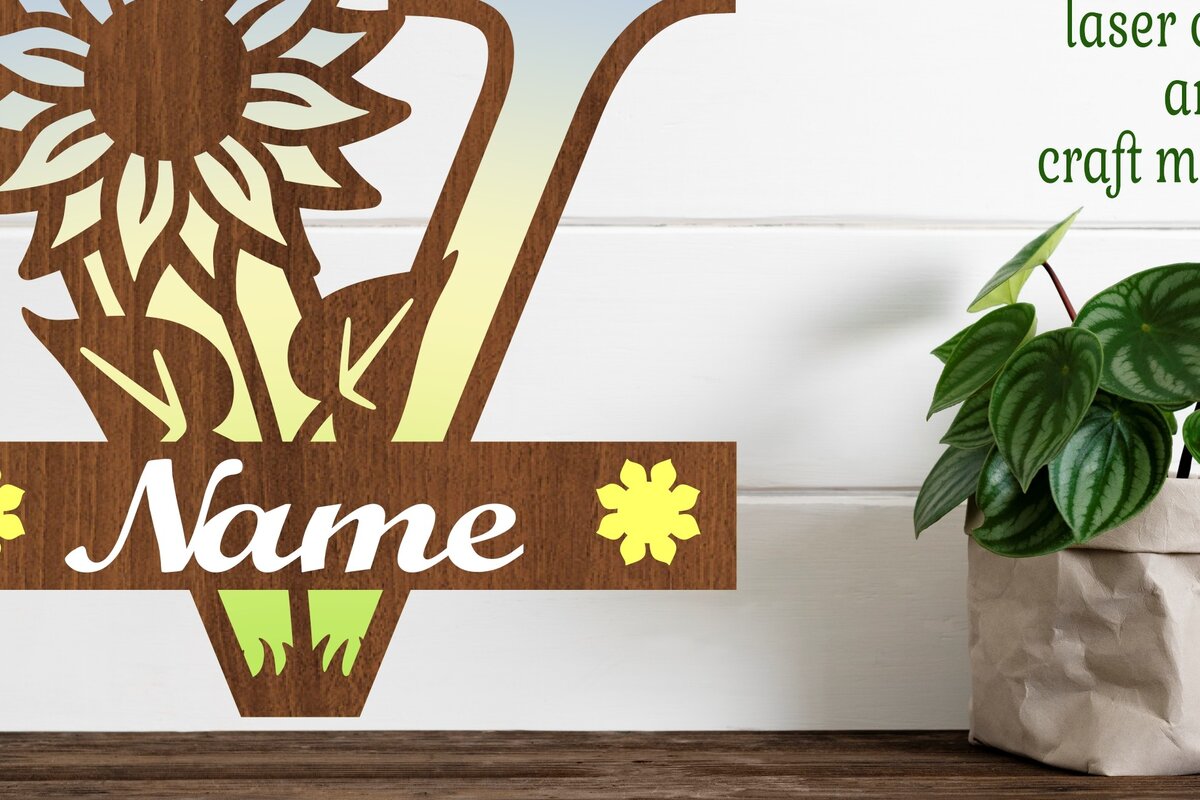 Σετ των 2 Intra απο ξύλο plywood 3mm-4mm πάχος – Ηλίανθος κεφαλαίο μονόγραμμα Γράμμα V Δίασταση  20x20 cm INTRAFABR-75965565