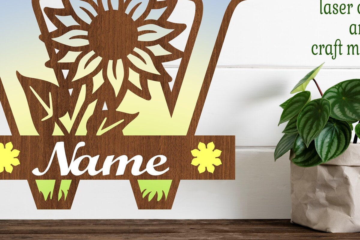 Σετ των 2 Intra απο ξύλο plywood 3mm-4mm πάχος – Μονόγραμμα Ηλίανθου κεφαλαίο Γράμμα W Δίασταση  20x20 cm INTRAFABR-75965585