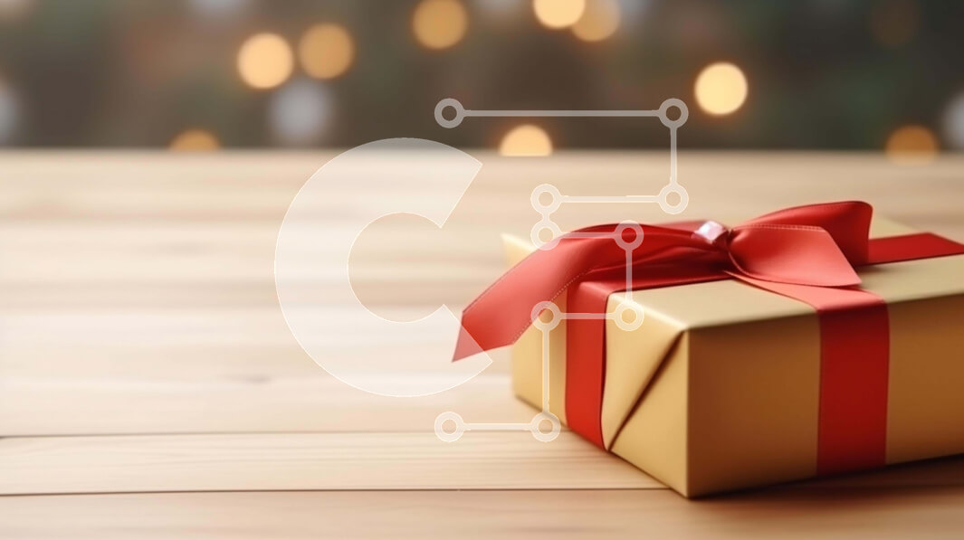 Intra Συλλεκτικό Ξύλινο Παζλ Plywood  4mm - Χρυσό κουτί δώρου με κόκκινη κορδέλα σε ξύλινο τραπέζι με χριστουγεννιάτικα φωτάκια Σε Ξύλινο Κουτί - Διαστάσεις: 10x10 cm – 25 κομμάτια