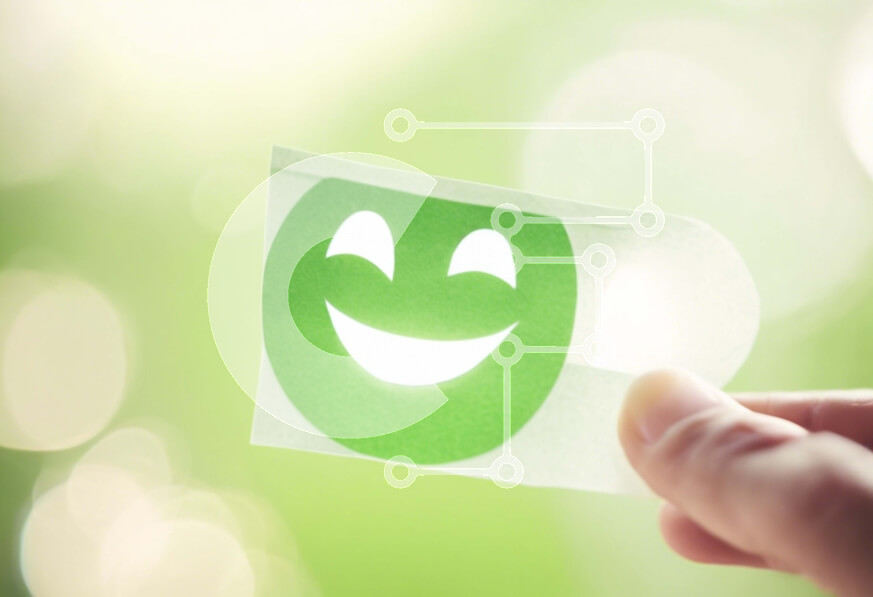 Intra Συλλεκτικό Ξύλινο Παζλ Plywood  4mm - Χέρι που κρατά αυτοκόλλητο πράσινο αυτοκόλλητο που αντιπροσωπεύει την ευτυχία Σε Ξύλινο Κουτί - Διαστάσεις Puzzle: 10x10 cm – 25 κομμάτια