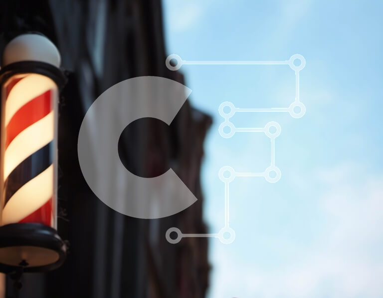 Intra Συλλεκτικό Ξύλινο Παζλ Plywood  4mm - Κουρέας κοντάρι μπροστά από ένα τούβλο κτίριο Σε Ξύλινο Κουτί - Διαστάσεις Puzzle: 10x10 cm – 25 κομμάτια