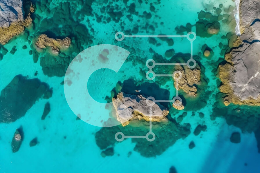 Intra Συλλεκτικό Ξύλινο Παζλ Plywood  4mm - Εκπληκτική εναέρια θέα σε μια βραχώδη ακτογραμμή με καταγάλανα νερά και μικρά νησιά Σε Ξύλινο Κουτί - Διαστάσεις Puzzle: 10x10 cm – 25 κομμάτια