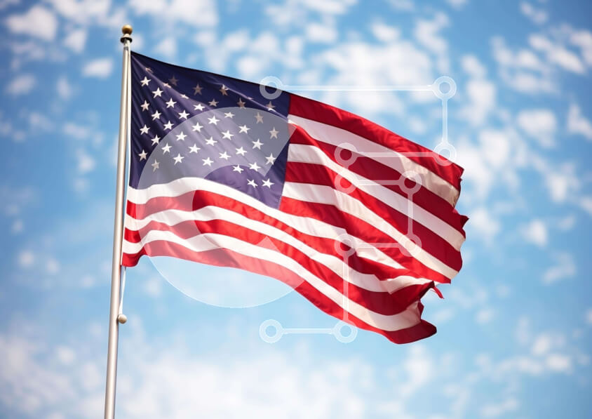 Intra Συλλεκτικό Ξύλινο Παζλ Plywood  4mm - Αμερικανική σημαία που κυματίζει στον άνεμο ενάντια στο Blue Sky και τα σύννεφα Σε Ξύλινο Κουτί - Διαστάσεις Puzzle: 10x10 cm – 25 κομμάτια