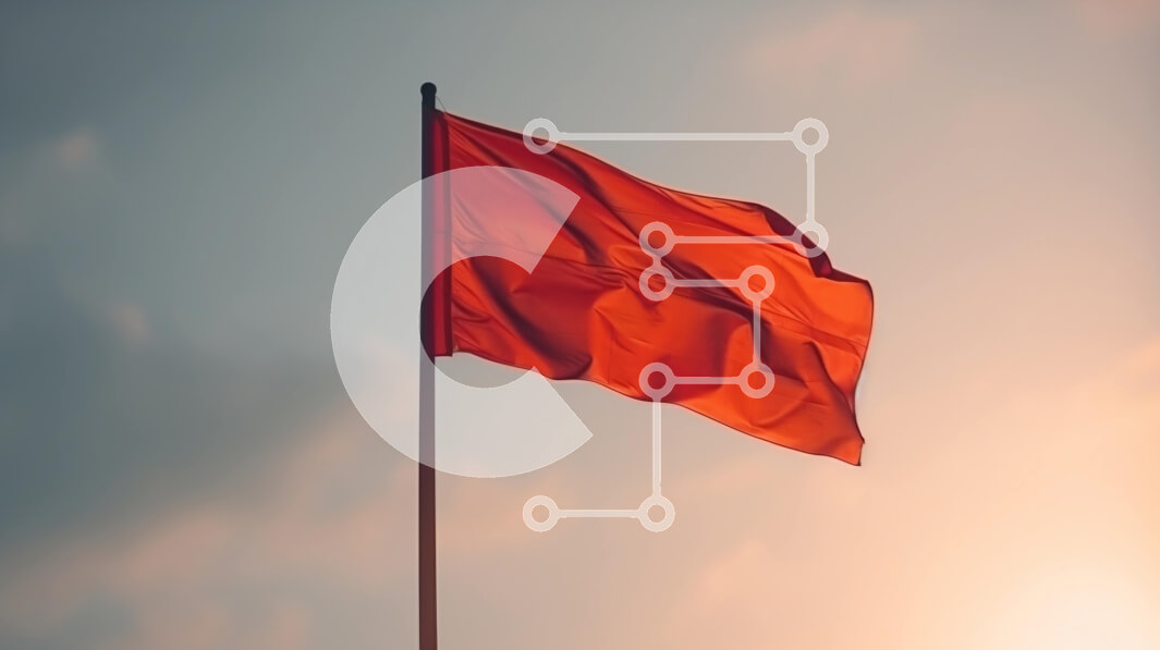 Intra Συλλεκτικό Ξύλινο Παζλ Plywood  4mm - Κόκκινη σημαία που κυματίζει στον άνεμο ενάντια στο μπλε ουρανό Σε Ξύλινο Κουτί - Διαστάσεις: 10x10 cm – 25 κομμάτια