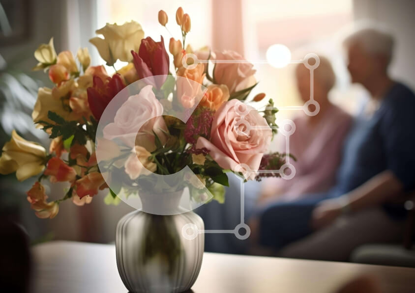 Intra Συλλεκτικό Ξύλινο Παζλ Plywood  4mm - Ηλικιωμένο ζευγάρι που απολαμβάνει πολύχρωμα λουλούδια σε γυάλινο βάζο Σε Ξύλινο Κουτί - Διαστάσεις Puzzle: 10x10 cm – 25 κομμάτια