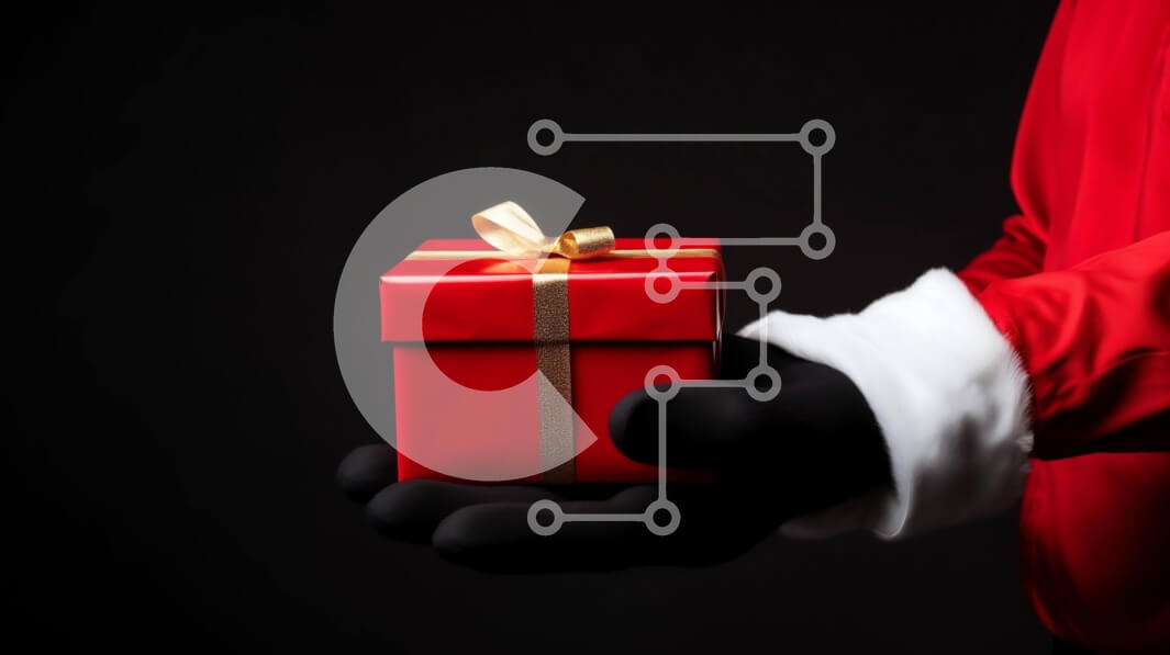 Intra Συλλεκτικό Ξύλινο Παζλ Plywood  4mm - Άτομο που κρατά διακοσμημένο κόκκινο κουτί δώρου με γάντια Άγιου Βασίλη Σε Ξύλινο Κουτί - Διαστάσεις: 10x10 cm – 25 κομμάτια