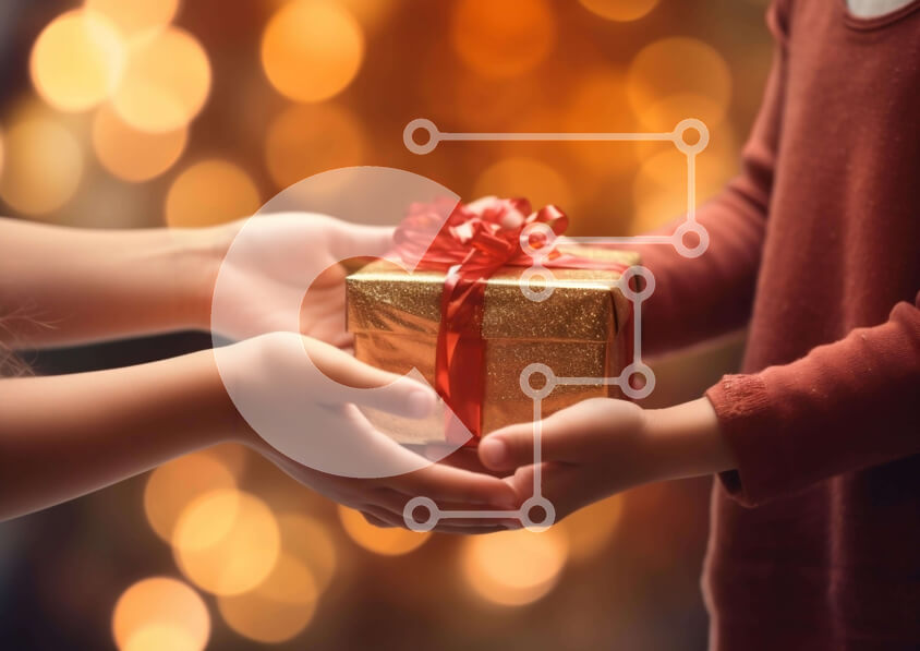 Intra Συλλεκτικό Ξύλινο Παζλ Plywood  4mm - Χρυσό κουτί δώρου με κόκκινη κορδέλα που κρατιέται από δύο χέρια Σε Ξύλινο Κουτί - Διαστάσεις: 10x10 cm – 25 κομμάτια