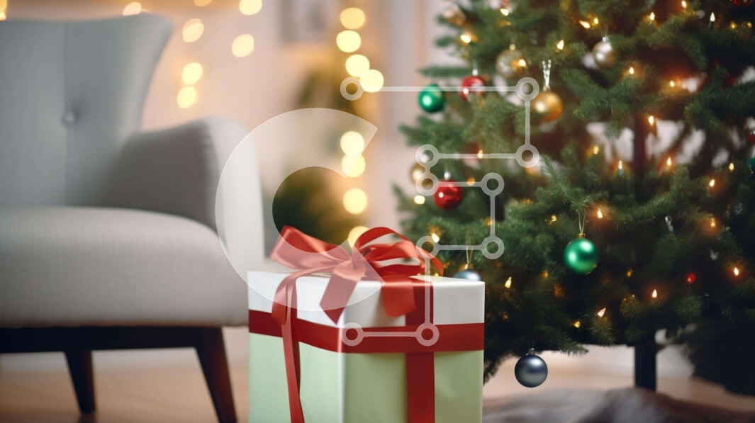 Intra Συλλεκτικό Ξύλινο Παζλ Plywood  4mm - Χριστουγεννιάτικο δώρο με κόκκινη κορδέλα δίπλα στο χριστουγεννιάτικο δέντρο Σε Ξύλινο Κουτί - Διαστάσεις: 10x10 cm – 25 κομμάτια