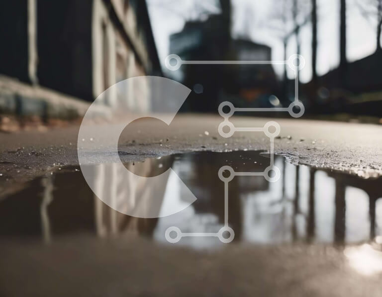 Intra Συλλεκτικό Ξύλινο Παζλ Plywood  4mm - Αστική λακκούβα με κτίρια στο παρασκήνιο Σε Ξύλινο Κουτί - Διαστάσεις Puzzle: 10x10 cm – 25 κομμάτια