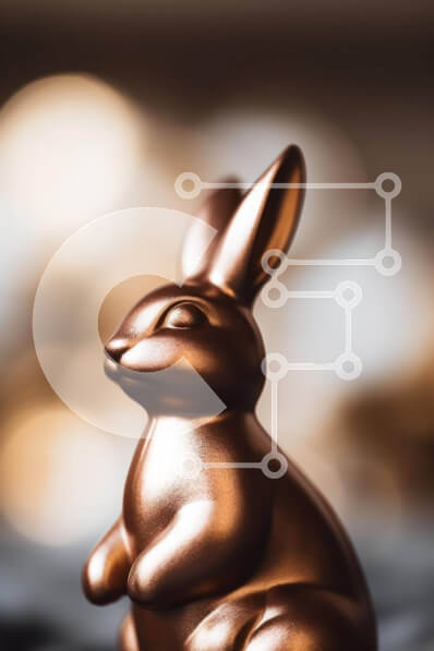 Intra Συλλεκτικό Ξύλινο Παζλ Plywood  4mm - Άγαλμα λαγουδάκι του Πάσχα σε πορτοκαλί φόντο Σε Ξύλινο Κουτί - Διαστάσεις Puzzle: 10x10 cm – 25 κομμάτια