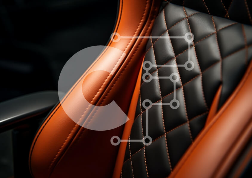 Intra Συλλεκτικό Ξύλινο Παζλ Plywood  4mm - Κοντινό πλάνο ενός πολυτελούς καθίσματος αυτοκινήτου με μαύρο και πορτοκαλί δέρμα Σε Ξύλινο Κουτί - Διαστάσεις Puzzle: 10x10 cm – 25 κομμάτια