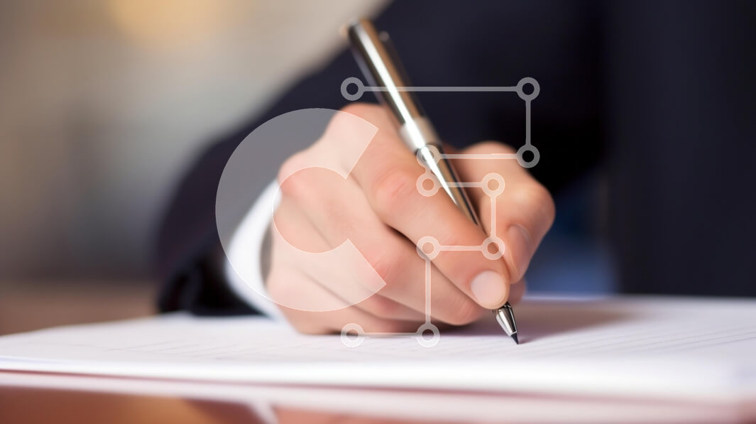 Intra Συλλεκτικό Ξύλινο Παζλ Plywood  4mm - Κοντινό πλάνο ενός χεριού που γράφει με στυλό Σε Ξύλινο Κουτί - Διαστάσεις Puzzle: 10x10 cm – 25 κομμάτια